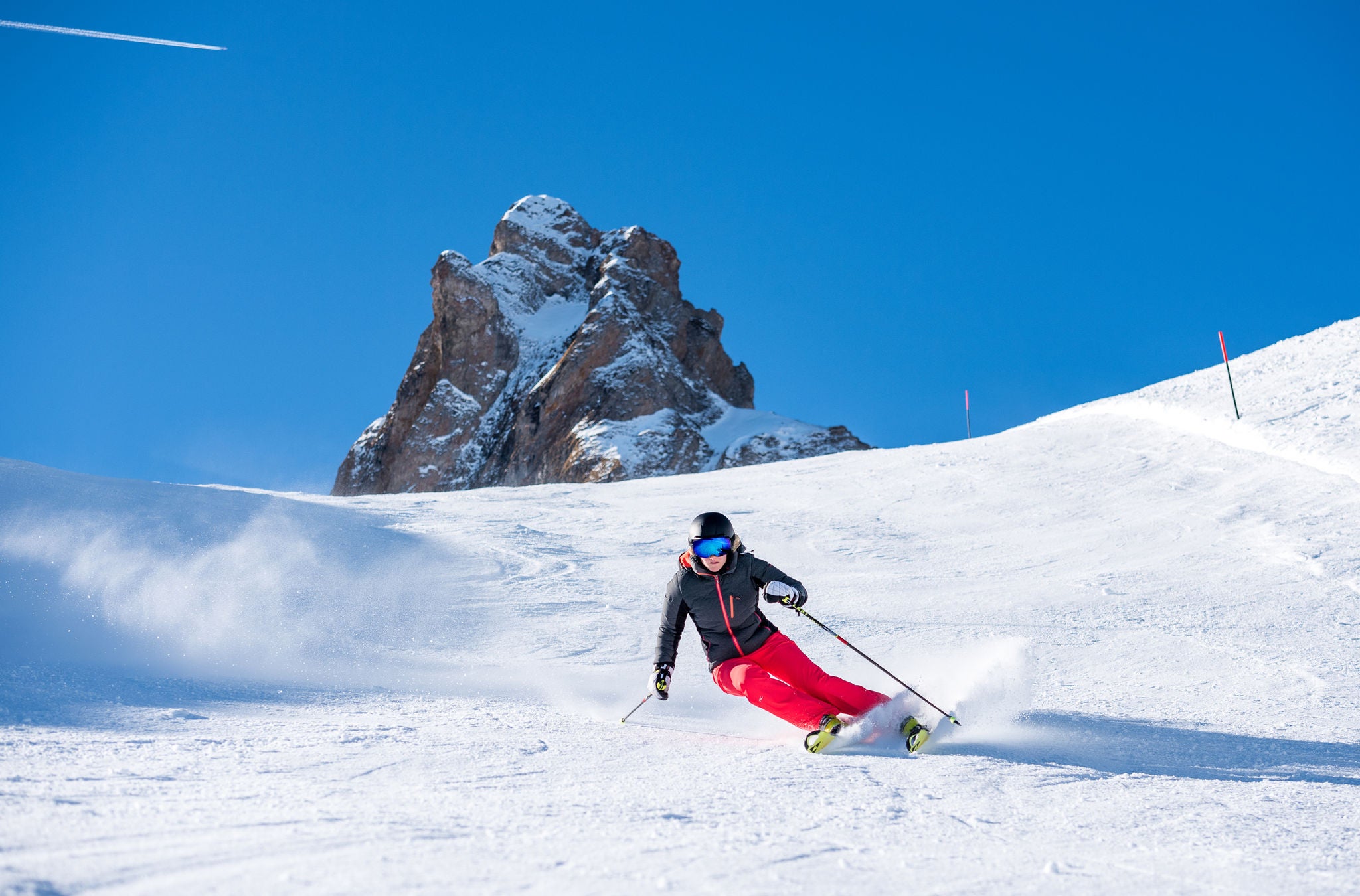 Frau auf der Skipiste am Flumserberg